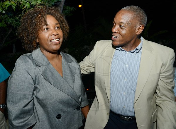 Rudolph Brown/Photographer
In discussion are Marjorie Lowe and Heston Hutton

JCCUL cocktail reception in honour of the existing stakeholders in the Jamaica Credit Union E-Payment Services (JCUES) its new mobile payment system at 9 Rosemarie Drive in St. Andrew on Friday, August 16, 2013