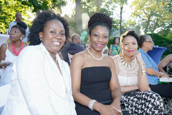 Gladstone Taylor / Photographer

Children of Jamaica Outreach (COJO) charity event held in queens new york on saturday the 21st 2014 consisting of a garden party, Fashion Show, Raffle and an Auction *** Local Caption *** Gladstone Taylor / Photographer
(from left) Denise McLaughlin, Jillian Armstead and AMelia Browne smile for our lens during the COJO garden Summer soiree.