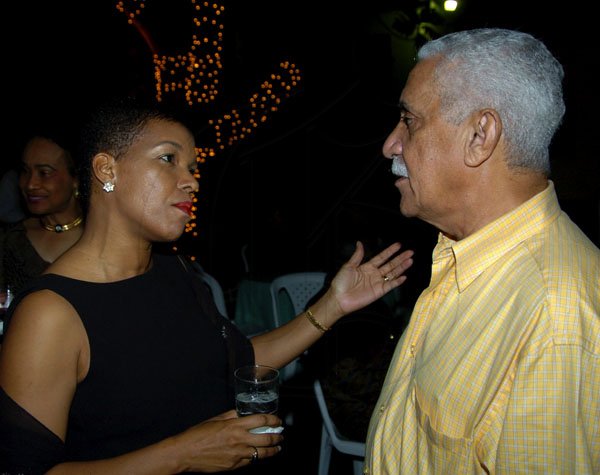 Winston Sill / Freelance Photographer
Paymaster's Audrey Marks chats with Col. Trevor MacMillan at Marguerite Orane's 50th birthday party.