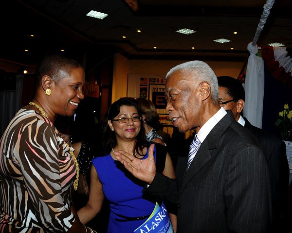 Winston Sill / Freelance Photographer
The Consular Corps of Jamaica annual International Trade Expo 2012 Opening Ceremony, held at the Jamaica Pegasus Hotel, New Kingston on Friday night October 5, 2012. Here are Dr. Iva Gloudon (left), Trinidad and Tobago High Commissioner; Indera Persaud (centre); and Minister AJ Nicholson (right).