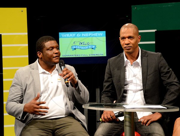 Winston Sill/Freelance Photographer
J Wray and Nephew presents the Wray and Nephew White Overproof Rum Contender 2014 Season Launch, held at TVJ Studios, Lyndhurst Road on Thursday night March 13, 2014. Here are Cecil Smith (left), Group Brand Manager-Rums, j wray and Nephew; and Gary Dixon (right) Marketing Director, J  Wray and Nephew.