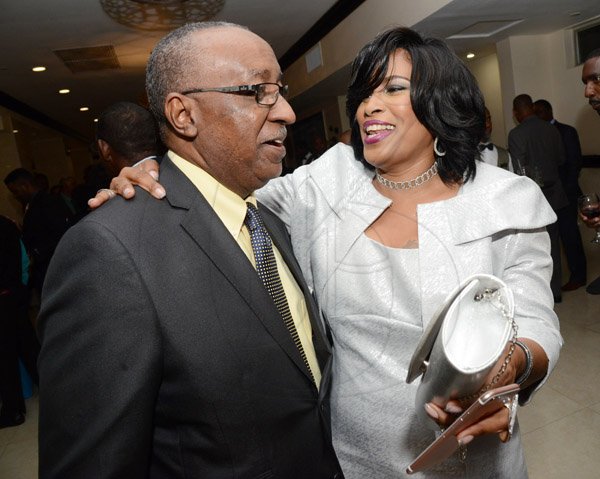 Rudolph Brown/Photographer
Pete Forrest, Senior Branch Manager of Sagicor Corporate Circle Branch chat with Susan Campbell Scarlett at the Sagicor Corporate CircleBranch awards at the Jamaica Pegasus Hotel in New Kingston on Friday, March 4, 2016