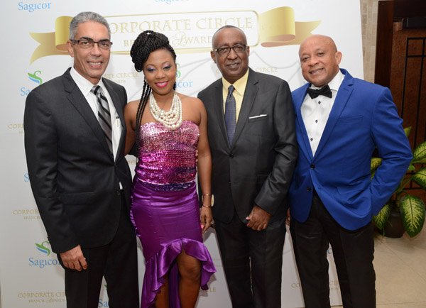 Rudolph Brown/Photographer
Rachel Singh pose with from left Richard Byles, President and CEO of Sagicor, Pete Forrest, Senior Branch Manager of Sagicor Corporate Circle Branch and Mark Chisholm, Executive VP, Individual Line of Sagicor at the Sagicor Corporate CircleBranch awards at the Jamaica Pegasus Hotel in New Kingston on Friday, March 4, 2016