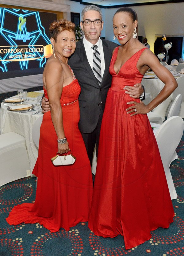 Rudolph Brown/Photographer
Richard Byles,  President and CEO of Sagicor pose with Lynette Chin McDaniel, (left) and Meila McKitty Plummer at the Sagicor Corporate CircleBranch awards at the Jamaica Pegasus Hotel in New Kingston on Friday, March 4, 2016