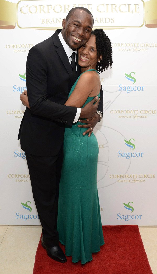 Rudolph Brown/Photographer
Merrick Plummer, Assistant VP Individual Line Sales and Distribution pose with Jennifer Rose at the Sagicor Corporate Circle Branch awards at the Jamaica Pegasus Hotel in New Kingston on Friday, March 4, 2016