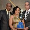 Rudolph Brown/Photographer
Richard Byles, (right) President and CEO of Sagicor and Pete Forrest, Senior Branch Manager of Sagicor Corporate Circle Branch presents the Agent of the Year Trophy to Lorraine Younger at the Sagicor Corporate Circle Branch awards at the Jamaica Pegasus Hotel in New Kingston on Friday, March 4, 2016