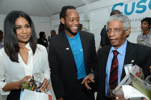 Rudolph Brown/Photographer
Lisa Hanna, Minister of Youth and Culture chat with Professor Neville Ying, (right) and Tarik Perkins, Country Representative, Cuso International at the Wealth Magazine corporate mingle at the Spanish Court Hotel in New Kingston on Friday, January 31, 2014