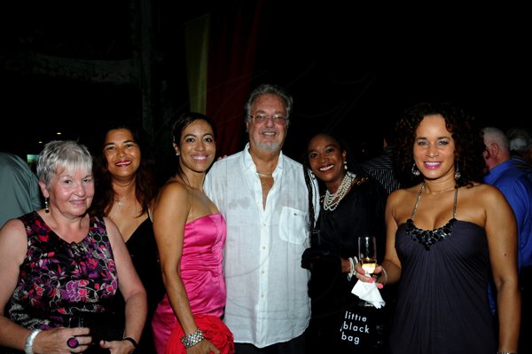 Winston Sill / Freelance Photographer
Couples Negril hosted its 13th Anniversary with a grand affair of a Reception, Dinner, Entertainment and Party, held at Couples in Negril, Hanover on Saturday  night October 8, 2011.