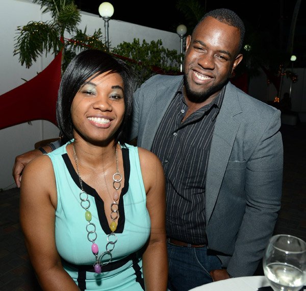 Rudolph Brown/Photographer
Kemisha Gray and Dale Henry at the Credit Union Fund management Company Christmas party at the Spanish Court Hotel in New Kingston on Friday, December 13, 2013