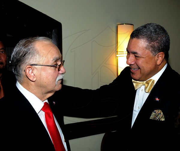Winston Sill / Freelance Photographer
Dr. Jose Tomas Ares German, ambassador of the Dominican Republic and wife Sheila Stefan de Ares host reception to celebrate the 168th Anniversary of Independence of Dominican Republic, held at the Jamaica Pegasus Hotel, New Kingston on Monday night February 27, 2012. Here are Noel Martinez (left), Venezuelan Ambassador; and Ambassador German (right).