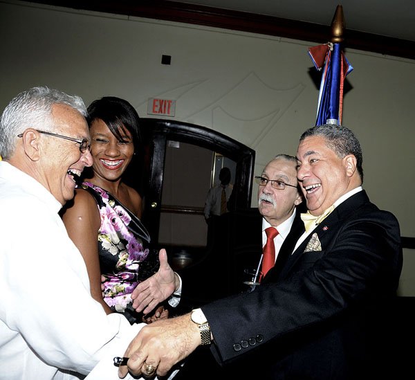 Winston Sill / Freelance Photographer
Dr. Jose Tomas Ares German, ambassador of the Dominican Republic and wife Sheila Stefan de Ares host reception to celebrate the 168th Anniversary of Independence of Dominican Republic, held at the Jamaica Pegasus Hotel, New Kingston on Monday night February 27, 2012. Here are Charles Johnston (left); Tanishia Ellis Hayles (second left); Ambassador Noel Martinez (second right); and Ambassador German  (right).
