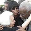 Ian Allen/Photographer
Maria Coore left, wife of the late David Coore is comforted by  former Prime Minister of Jamaica P.J.Patterson right and Opposition Leader Portia Simpson-Miller shortly after the funeral service at the Holy Trinity Cathedral on Saturday.