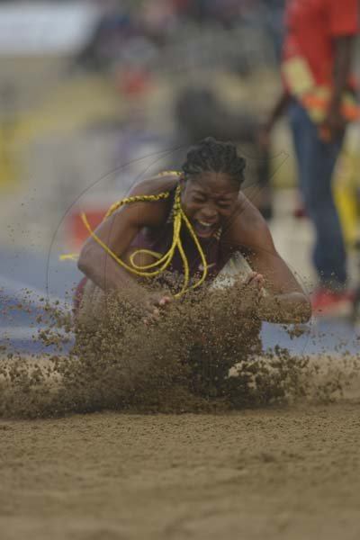Shorn Hector/Photographer Susan Francis of Holwood Technical wins the girl's class one long jump with a leap of 6.26 meters on  day five of the ISSA/GraceKennedy Boys and Girls’ Athletics Championships held at the The National Stadium in Kingston on Saturday March 30, 2019