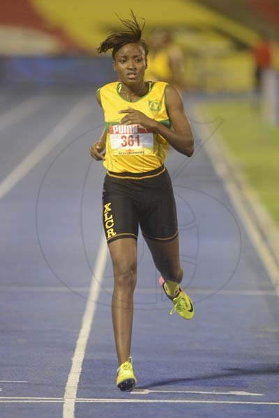 Shorn Hector/Photographer Brittaney Orr og Excelsior High strides across the finish line winning section three of the girl's Heptathalon 800 meter on  day five of the ISSA/GraceKennedy Boys and Girls’ Athletics Championships held at the The National Stadium in Kingston on Saturday March 30, 2019