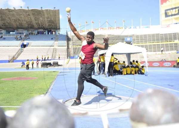Shorn Hector/Photographer Tyrece Thompson of godfrey Stewart competing in the boys class one shot put on day four of the ISSA/GraceKennedy Boys and Girls’ Athletics Championships held at the The National Stadium in Kingston on Friday March 29, 2019