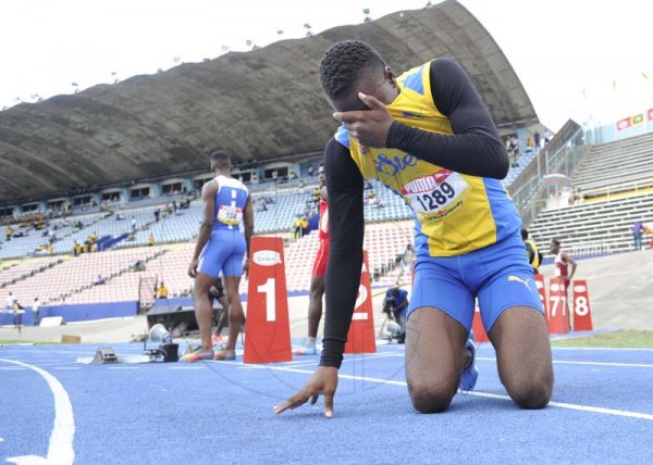 Shorn Hector/Photographer A distraught Michael Buchannan of St Elizabeth technical  after being ejected from the boys class one 110 meter hurdles on day four of the ISSA/GraceKennedy Boys and Girls’ Athletics Championships held at the The National Stadium in Kingston on Friday March 29, 2019