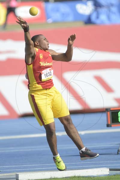 Shorn Hector/Photographer Mikhail Wright of Wolmer's bys competing in the boys class one shot put on day four of the ISSA/GraceKennedy Boys and Girls’ Athletics Championships held at the The National Stadium in Kingston on Friday March 29, 2019