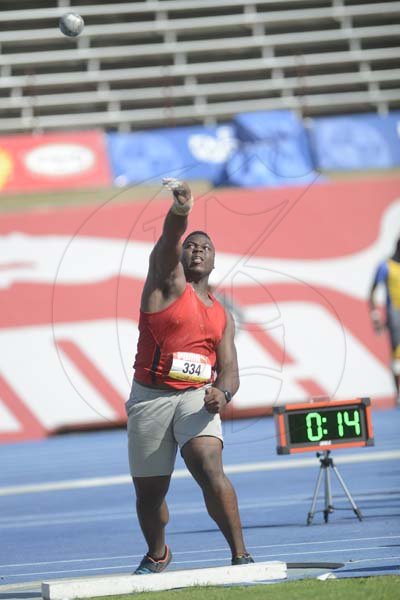 Shorn Hector/Photographer Mikhali Dias of Cornwall College competing in the boys class one shot put on day four of the ISSA/GraceKennedy Boys and Girls’ Athletics Championships held at the The National Stadium in Kingston on Friday March 29, 2019