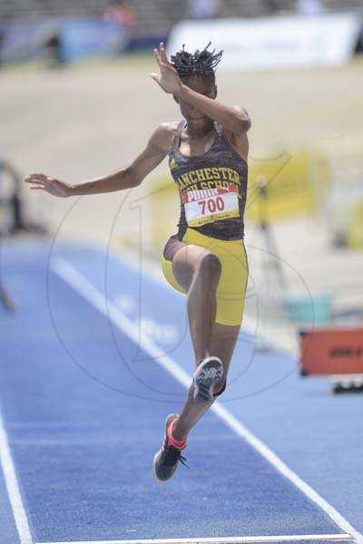 Shorn Hector/Photographer Shinelle Thomas of Manchester High competing in the girls class three long jump on day four of the ISSA/GraceKennedy Boys and Girls’ Athletics Championships held at the The National Stadium in Kingston on Friday March 29, 2019