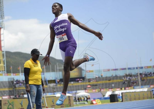 Shorn Hector/Photographer Christopher Seaton of Kingston College competing in the boys class three long jump on day four of the ISSA/GraceKennedy Boys and Girls’ Athletics Championships held at the The National Stadium in Kingston on Friday March 29, 2019