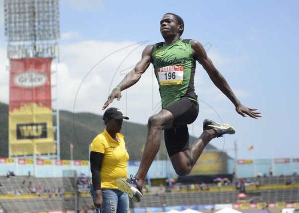 Shorn Hector/Photographer Javar Thomas of Calabar competing in the boys class three long jump on day four of the ISSA/GraceKennedy Boys and Girls’ Athletics Championships held at the The National Stadium in Kingston on Friday March 29, 2019