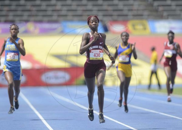 Shorn Hector/Photographer Daniella Deer of Holmwood Tech wins heat one of the girls class two 400 meter semifinal onday four of the ISSA/GraceKennedy Boys and Girls’ Athletics Championships held at the The National Stadium in Kingston on Friday March 29, 2019