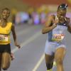 Shorn Hector/Photographer Kevona Davis (right) wins girls class two 100 mete final on day four of the ISSA/GraceKennedy Boys and Girls’ Athletics Championships held at the The National Stadium in Kingston on Friday March 29, 2019