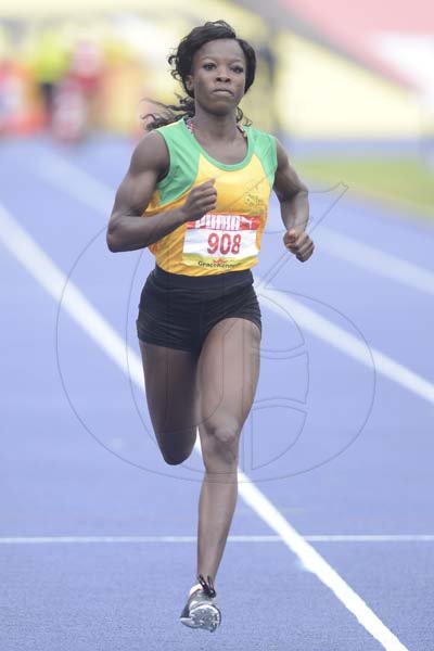 Shorn Hector/Photographer Ockera Myrie of Petersfield wins heat two of the girls class one 100 meter dash onday three of the ISSA/GraceKennedy Boys and Girls’ Athletics Championships held at the The National Stadium in Kingston on Thursday March 28, 2019