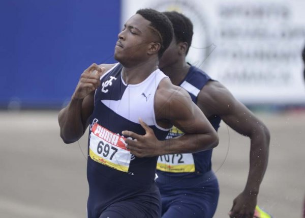 Shorn Hector/Photographer Michali Everett of jamaica College wins heat three of the boys class one 100 meter dash on day three of the ISSA/GraceKennedy Boys and Girls’ Athletics Championships held at the The National Stadium in Kingston on Thursday March 28, 2019