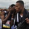 Shorn Hector/Photographer J'Voughn Blake of Jamaica College (left) is consoled by teammate Omarion Davis after winning heat three of the boys class two 800m. Blake wanted to set a new record on day three of the ISSA/GraceKennedy Boys and Girls’ Athletics Championships held at the The National Stadium in Kingston on Thursday March 28, 2019