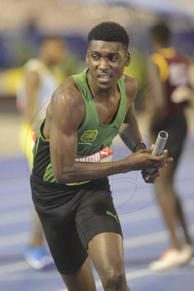 Shorn Hector/Photographer Kimar Farquharson of Calabar high cometing in the bos 4x400 meter relay open on day three of the ISSA/GraceKennedy Boys and Girls’ Athletics Championships held at the The National Stadium in Kingston on Thursday March 28, 2019
