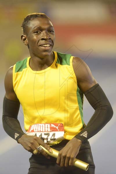 Shorn Hector/Photographer Antonio Watson of Petersfield anchors his team to victory in heat four of the boys 4x400 meter relay open on day three of the ISSA/GraceKennedy Boys and Girls’ Athletics Championships held at the The National Stadium in Kingston on Thursday March 28, 2019