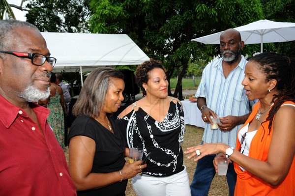 Winston Sill/Freelance Photographer
Debbie? Hamilton 50th Birthday Party, held at Ham Stables, Port Henderson Road, Portmore on Sunday September 8, 2013. Here are Patrick Bailey (left);  Minera Pagon (second left); Lisa Lewis (centre); Hamlin Pagon (second right); and Clare Miller (right).