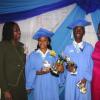 JIS Photo
 
 
Chief Education Officer in  the Ministry of Education, Grace McLean (left), and Principal of the Denbigh High School, in Clarendon, Jean Porter (right), with top achievers at the institution, graduate of the year, Michael Lewis and top Mathematics student, Alecia Watson. Occasion was the 2011 graduation ceremony at the school, on June 29.