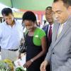 Ricardo Makyn/Staff Photographer
From left Christopher Levy, president and chief executive officer, Jamaica Broilers Group, and Tahnida Nunes, sponsorship manager, Digicel; examine fruit and vegetables on display with Glendon Harris, president of the Jamaica Agricultural Society and Minister of Agriculture Dr Christopher Tufton during yesterday's launch of Denbigh 2011 on the lawns of Ace Supercentre in White Marl, St Catherine.