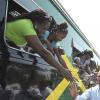 Ian Allen/Photographer
Prime Minister Bruce Golding, on arrival at the Spanish Town Railway Station in St Catherine yesterday, is greeted by passengers on the train travelling to Denbigh in Clarendon for the final day of the annual Denbigh Agricultural Show. Golding also took the train to Denbigh.