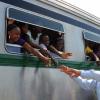 Ian Allen/Photographer
Prime Minister Bruce Golding ion his arrival at the Spanish Town Railway Station is being greeted by passengers on the Train travelling to Denbigh in Clarendon for the annual Denbigh Agricultural Show.