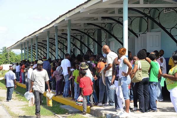 Ian Allen/Photographer
Hundreds of persons waiting at the Spanish Railway Station to get on the Train to take them to Denbigh in Clarendon.