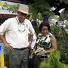 Dr. the Hon. Christopher Tufton, Minister of Agriculture and Fisheries, and Joan Grodon Webley at the NSWMA booth at the Denbigh Argicultural Show.