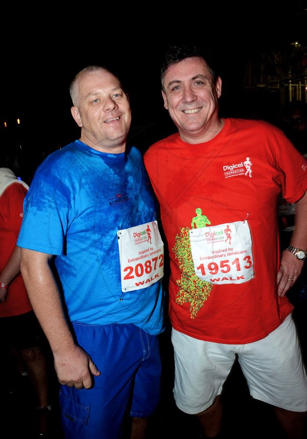 Winston Sill/Freelance Photographer
Digicel Foundation 5K Run/Walk for Special Needs, held on the Waterfront, Downtown Kingston on Saturday night  October 11, 2014. Here are David Hall (left, former CEO, Digicel; and Barry O'Brien (right), CEO, Digicel.