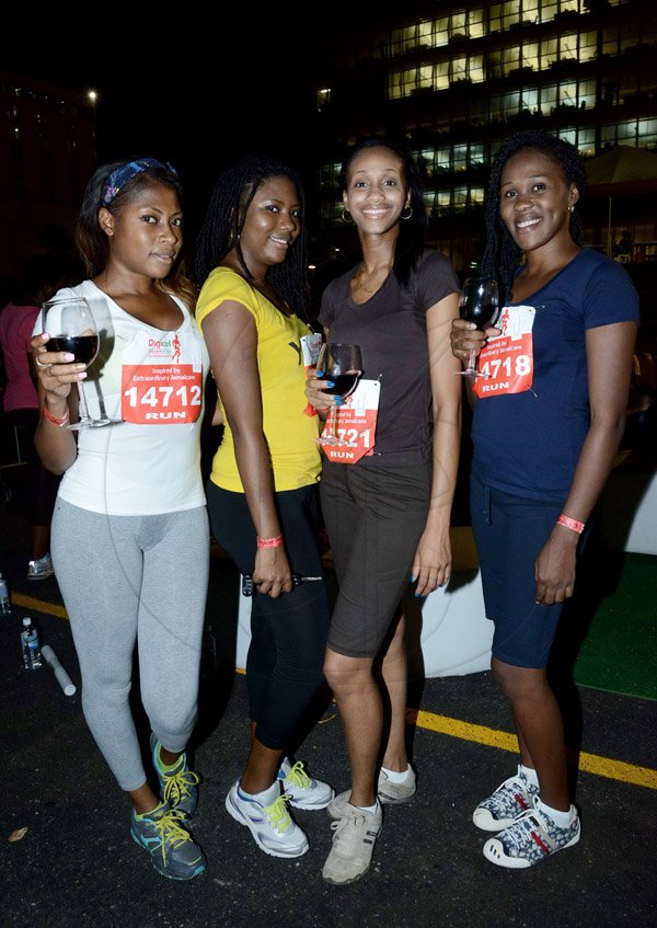 Winston Sill/Freelance Photographer
Digicel Foundation 5K Run/Walk for Special Needs, held on the Waterfront, Downtown Kingston on Saturday night  October 11, 2014. Here are Sheryl Smith (left); Krystal Smith (second left); Rhoda Crawford (second right); and Alethia Buckle (right).
