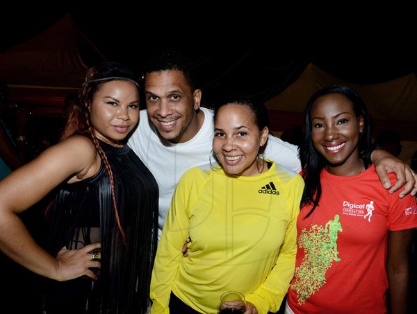 Winston Sill/Freelance Photographer
Digicel Foundation 5K Run/Walk for Special Needs, held on the Waterfront, Downtown Kingston on Saturday night  October 11, 2014. Here are Ce'Cile (left); Banbino (second left); Shelly-Ann Curran (centre); and Judine Hunter (right).