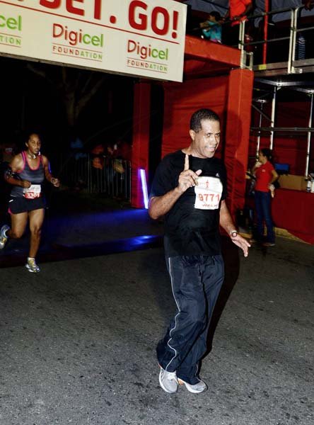 Winston Sill/Freelance Photographer
Digicel Foundation 5K Night Run/Walk and Concert, held on Ocean Boulevard, Downtown on Saturday night October 26, 2013. Here is Tanny Shirley.