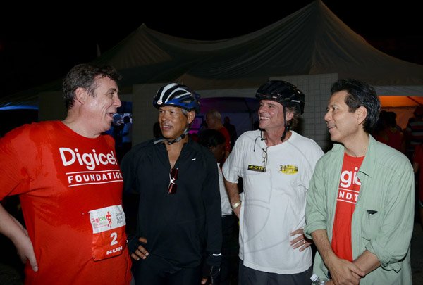 Winston Sill/Freelance Photographer
Digicel Foundation 5K Night Run/Walk and Concert, held on Ocean Boulevard, Downtown on Saturday night October 26, 2013. Here are Barry O'Brien (left), CEO, Digicel; Donovan Perkins (second left); John Bailey (second right); and Anthony Chang (right).