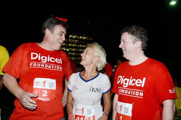 Winston Sill/Freelance Photographer
Digicel Foundation 5K Night Run/Walk and Concert, held on Ocean Boulevard, Downtown on Saturday night October 26, 2013. Here are Barry O'Brien (left), CEO, Digicel; Kelly Tomblin (centre), CEO JPS; and Andy Thorburn (right).