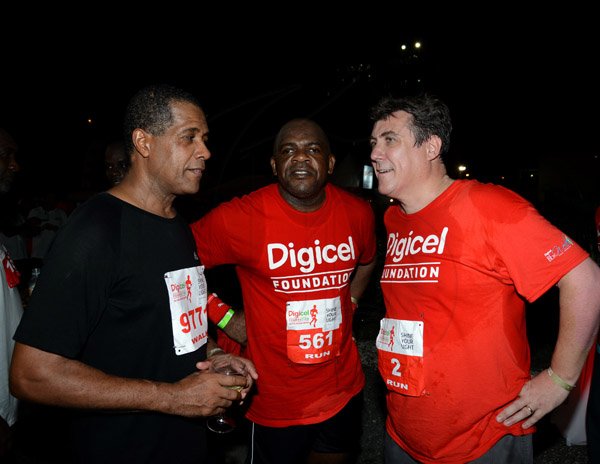 Winston Sill/Freelance Photographer
Digicel Foundation 5K Night Run/Walk and Concert, held on Ocean Boulevard, Downtown on Saturday night October 26, 2013. Here are Tanny Shirley (left); Senator Floyd Morris (centre); and Barry O'Brien (right), CEO, Digicel.