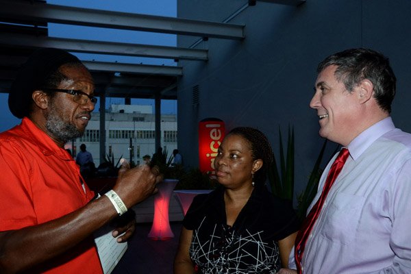 Winston Sill/Freelance Photographer
PUBLIC AFFAIRS and SOCIAL DESKS:-----The Digicel Foundation 5K Night Run/Walk 2014 Launch, held at Digicel Headquarters, Ocean Boulevard, Downtown, Kingston on Wednesday August 13, 2014. Here are Alfred "Frano" Francis (left); Lorna Clarke  (centre); and Barry O'Brien (right), CEO, Digicel.