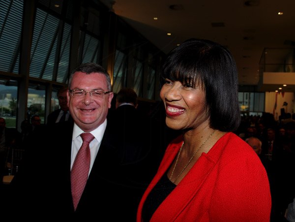 Winston Sill / Freelance Photographer
The Official Opening of Digicel Regional Headquarters by Prime Minister Portia Simpson-Miller, held at Ocean Boulevard on Tuesday March 19, 2013. Here are Colm Delves (left), CEO, Digicel Group; and Prime Minister Simpson-Miller (right).