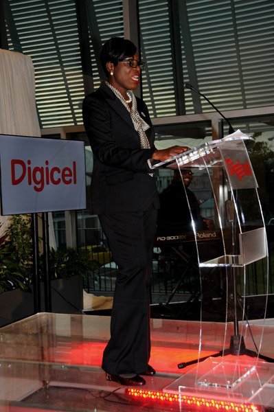 Winston Sill / Freelance Photographer
The Official Opening of Digicel Regional Headquarters by Prime Minister Portia Simpson-Miller, held at Ocean Boulevard on Tuesday March 19, 2013. Here is Debbie Williams, Head Receptionist, Digicel Group.