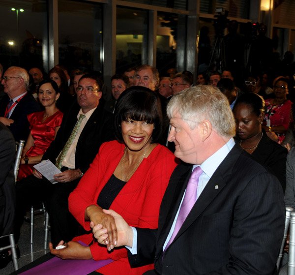 Winston Sill / Freelance Photographer
The Official Opening of Digicel Regional Headquarters by Prime Minister Portia Simpson-Miller, held at Ocean Boulevard on Tuesday March 19, 2013. Here are Denis O'Brien (right), Chairman, Digicel Group; and Prime Minister Simpson-Miller (left).